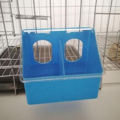 China PP Material Plastic Pigeon Drinkers And Animal Feeders Two Hole Pigeon Feeder for sale