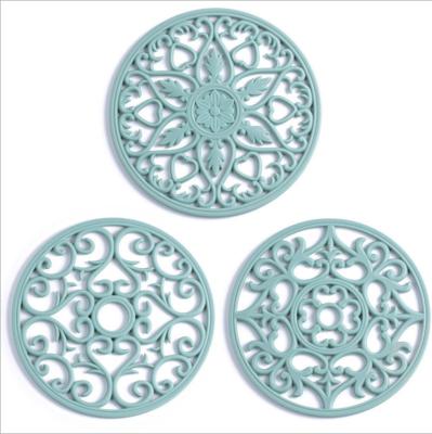 China Sustainable Multi-Use Intricately Carved Hot Pot Trivets For Kitchen Hot Mats Table Mats Insulated Flexible Dishes Non-slip for sale