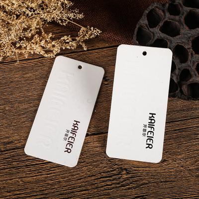 China Sustainable Hang Tags Designer Apparel Custom White Cardboard Paper Swing Hang Tag tagsfor clothes for sale