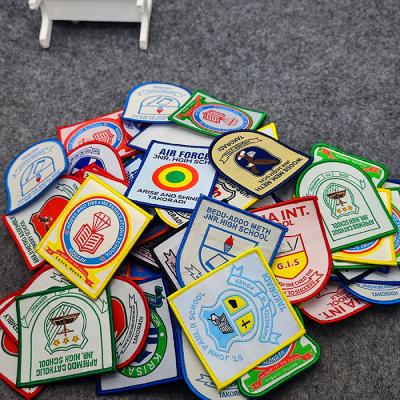 China Hot Sale School Crest Badge School Uniform Nickel Free Custom Patch Woven Badges With Logo for sale