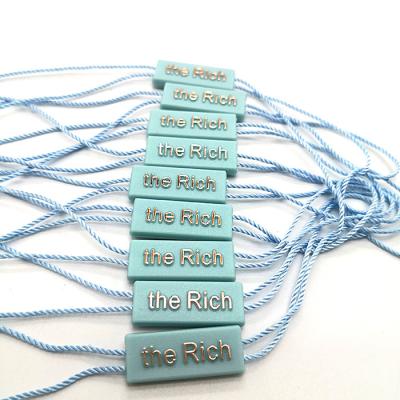 China Colorful Plastic Pellet String Tag Customized Sustainable Hanging Hanging Tablet For Clothing for sale