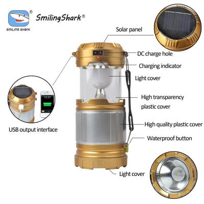 China Ultra Bright Telescopic Plastic Hanging LED Solar Camping Light Shark LED Smile Camping Solar Light for sale