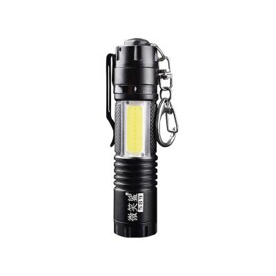 China Strong Light Smile Rechargeable Type Flashlight Shark High Power Multifunctional Mini Flashlight for sale