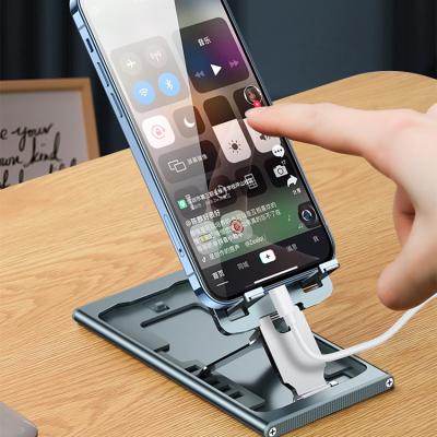 China Waterproof Smart Desktop Phone Stand Metal Lazy Phone Stand Holder for Mobile Phone and Laptop Hands Hold Freely Adjustable Height for sale