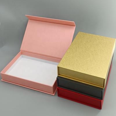 China Recyclable Custom Packaging Art Paper Clamshell Book Shape Gift Box With Magnet Closure for sale