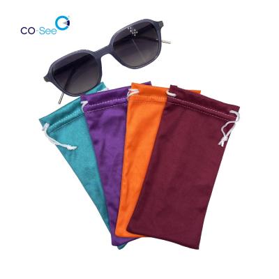 China Custom Logo Cheap Drawstring Soft Jewelry Microfiber Drawstring Cloth Sun Glass Pouch Bag Eyewear Accessories for sale