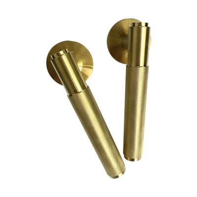 China Modern Front Entry Lever Modern Door Handle Set Handles Luxury Interior Exterior Knurled Gold Tubular Metal Door Handle Lock Set for sale