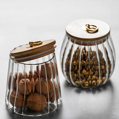 China Airtight Sealed Glass Stocked Container Food Storage Cans Kitchen Storage Jar With Bamboo Lid Metal Buckle for sale