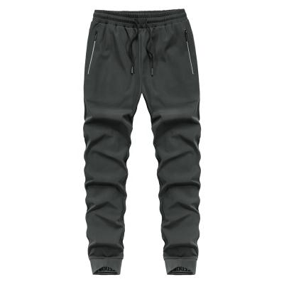 China Wholesale Custom High Quality LOGO Cotton Zipper Pocket Joggers Mens Gym Track Pants Anti-Wrinkle Slim Fit Pants for sale