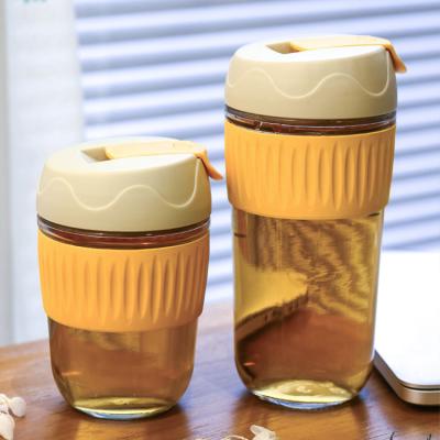 China Wholesale Viable Amazon Success Tumbler Travel Portable Leakproof Mug Insulated Glass Coffee Mug With Silicone Sleeve for sale