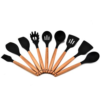 China Viable Hot Selling High Quality Silicone Handle Wooden Kitchen Cookware Set for sale