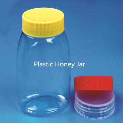 China Candy Peanut Butter Clear Food Grade Plastic Jar With Custom Color Cap for sale