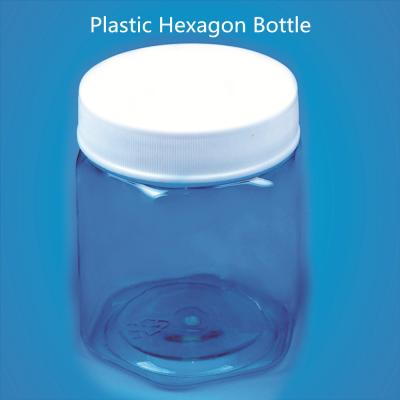 China Plastic Candy Hexagon PET Screw Cap Jar For Food Packaging for sale