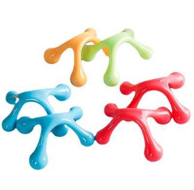 China Hot Selling A Body Plastic Four Point Hand Held MASSAGE TOOL With 4 Pressure Point Body Massager for sale