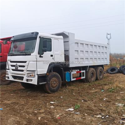 China Sand Gravel SINOTRUK HOWO Dump Truck Used 25 Ton Dump Truck Hydraulic System Safety Discharge for sale