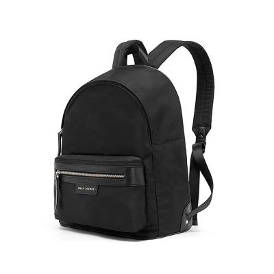 China Water Resistant Fashion Minimalist Backpacks Black Waterproof Mid Layer Bag Fabric Backpack Durable Women Laptop Backpack for sale