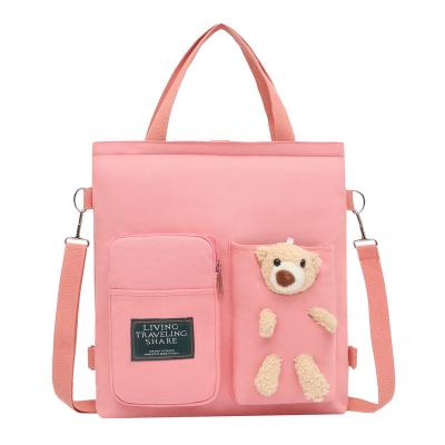 China 2022 New Large Capacity Wear-resistant Multi Purpose Canvas Bag Kids School Bag Student Backpack Bag for sale