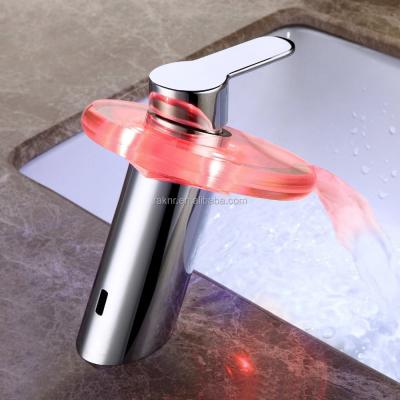 China Promotional Electric Faucets Color Changing LED Waterfall Bathroom Sink Faucet With Glass Spout for sale