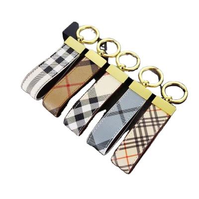 China Luxury Brand Designer Genuine Leather Key Rubber Chain For Women Key Ring Accessories Keychain Bulk Leather Keychains Reduce Key Chain for sale