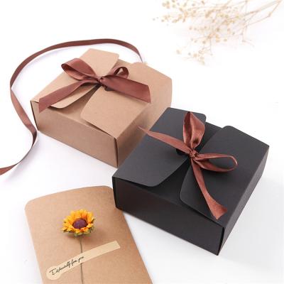 China Recycled Materials Wholesale Custom Brown Foldable Kraft Paper Gift Wrapping Paper Box With Ribbon for sale