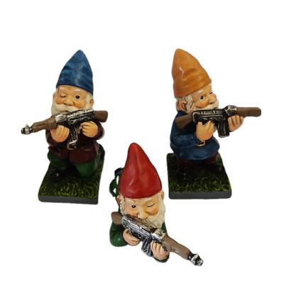 China Europe Handcraft Drop Shipping Doll Gnome Figurines Yard Sculpture Hold Gun Fairy Statue Army Garden Gnome Crafts for sale