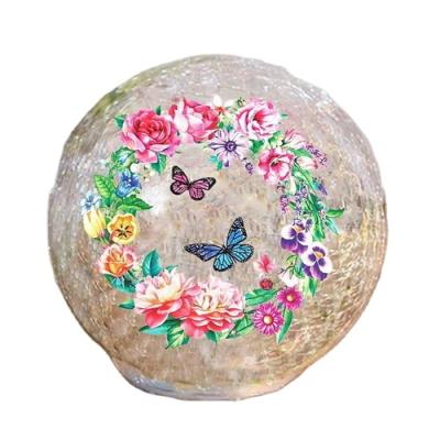 China Special Novelty Gift LED Butterfly Flower Pattern Round Clear Glass Ball Led Crackle Lead Glass Light Ball for sale