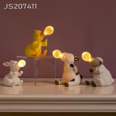 China Novelty Home Decoration Resin Ornament LED Animal Shaped Transparent Bulb Bauble With Light for sale