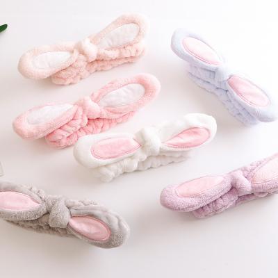 China Cute Pink Bunny Ears Wash Face Shower Elastic Headband Makeup Hairband Women Wholesale Non-slip Headband for sale