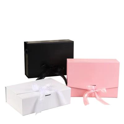 China Recycled Materials PINK Wholesale Custom Logo Premium Luxury Cardboard Paper Gift  Packaging Box Customized Ribbon Art for sale