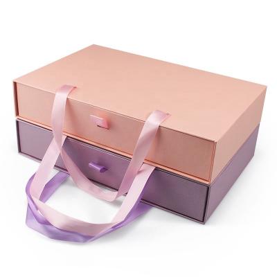 China Recyclable Factory custom hot sale rigid cardboard folding skincare set gift paper box clothing small gift box packaging for sale