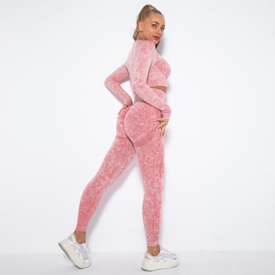 China Breathable New seamless washing smiley face yoga exercise fitness long sleeve top butt lift yoga pants set for sale