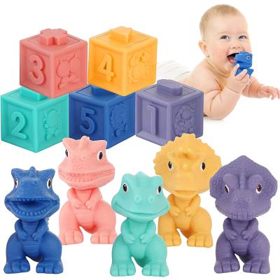 China Eco-Friendly Material Infants Toddler Teething Toys Dinosaur Baby Squeeze And Stack Building Block Set for sale