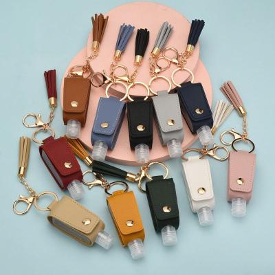 China New Mini Leather Hand Sanitizer Bottle Key Chain Bag Small Portable Pendant Portable Hand Sanitizer Key Chain for sale