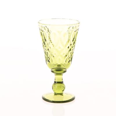 China Chinese Professional Transport Factory Cheap Pressed Colored Embossed Goblet Wine Glass Wine Glasses for sale