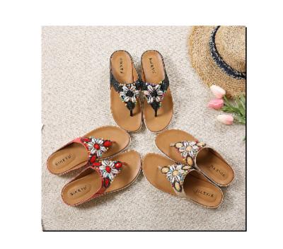 China Fashion trend the new 2022 retro national bohemian beach summer wind sandals beaded shells slippers by the sea for sale