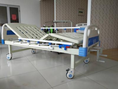 China Spray Steel 2 Cranks Manual Hospital Bed With ABS Headboard And Footboard for sale