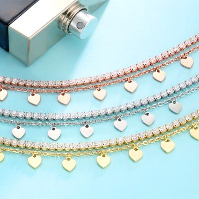 China Custom Non-fading Fashion Summer Women Double Foot Chain Silver 18K Gold Plated Tasty Stainless Steel Hearts Charm Tennis Layered Anklet for sale