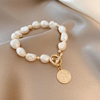 China Vintage Gold Plated Adjustable Pearl Beads Bracelet Jewelry For Women White Gift for sale