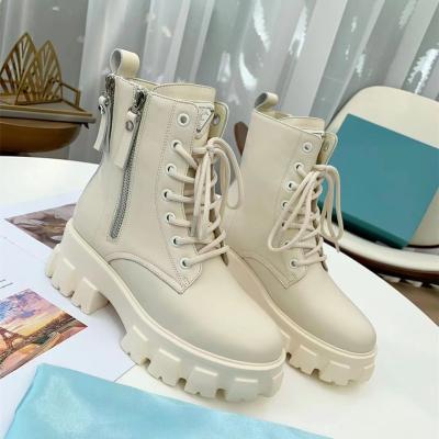 China New plush winter autumn new waterproof women's boots Martin 2021 high heel thick soled leather short boots stack thick heel boots for sale