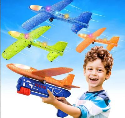 China Airplane Eco-friendly Material Flying Toy With Launcher Foam Airplane Launching Activities Outside Outdoor Flying For Kids for sale