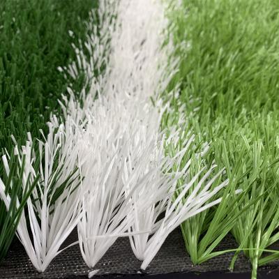 China Latest High Quality Fire Resistant And Water Permeable Artificial Grass 5cm Popular Artificial Football Grass 5cm Soccer Football Grass for sale