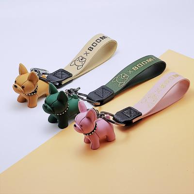 China Decoration Cartoon Gift Mine Bull Key Chain French Puppy Tanning Cute Couples Belt Silicone Belt Bull Shiba Key Chain for sale