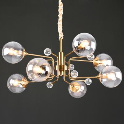 China Modern Trendy Design Popular Black Glass Dining Brass Chandelier for sale