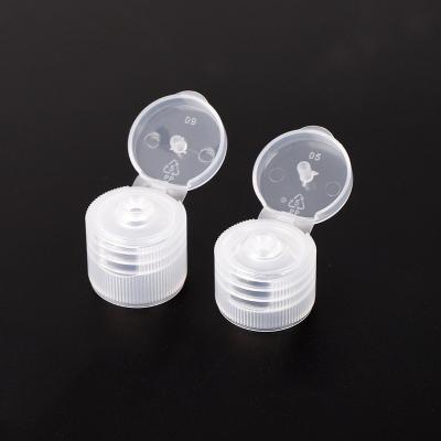 China Wholesale 20mm/410 24mm/410 28mm/410 Transparent Round PP Non Spill Lid Cosmetic Plastic Bottle Flip Top Cap for sale