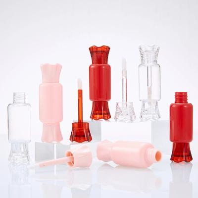 China Wholesale Custom Cute Empty Plastic 12ml Mini Candy Cosmetic Shaped Lip Gloss Tube Container With Magic Wand for sale