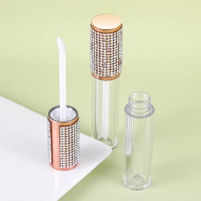 China Custom empty bling cosmetic packaging 4.5ml glitter faux stone lip gloss wand tube containers with logo for sale