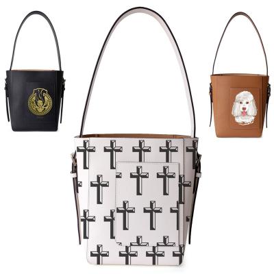 China 2022 High Quality Trending Bucket Bags With Pocket PU Crucifixion Pattern Custom Leather Cross Purses And Handbags Shoulder Bags Ladies for sale