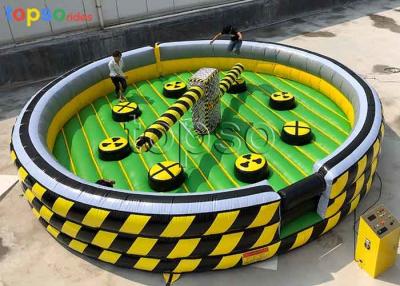 China Safe Portable Amusement Rides Wipeout Jumping Castle Positive Participation for sale