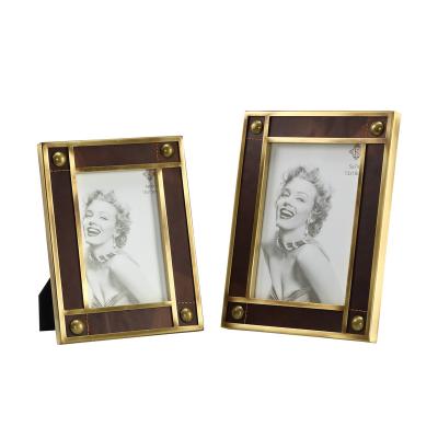 China Modern Minimalist Creative Leather Light Luxury Photo Frame Display 6 Inch 7 Inch European Style Desktop Picture Home Decoration for sale