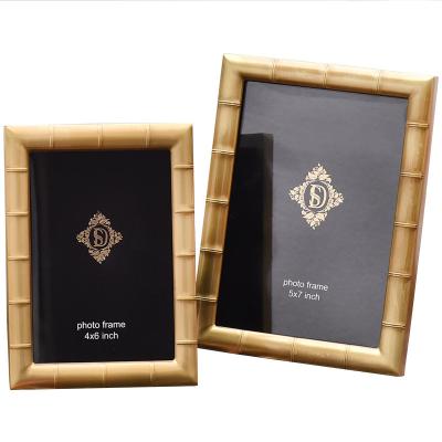 China Luxury European Picture Frame Set 6 Inch 7 Inch - Brass Metal Picture Frame Desktop Room High Grade Brass Pattern Picture Frame for sale